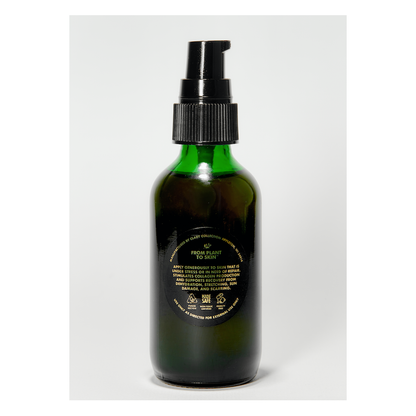 Clary Collection Renew + Repair Oil 2oz in a clear glass bottle with a dropper cap, designed for hair and skin care.