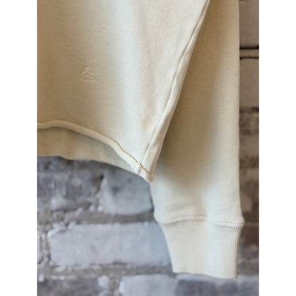 Women's retro fleece hoodie with raw hem in cashew color by Merz b. Schwanen, showing front view with hood and relaxed fit.