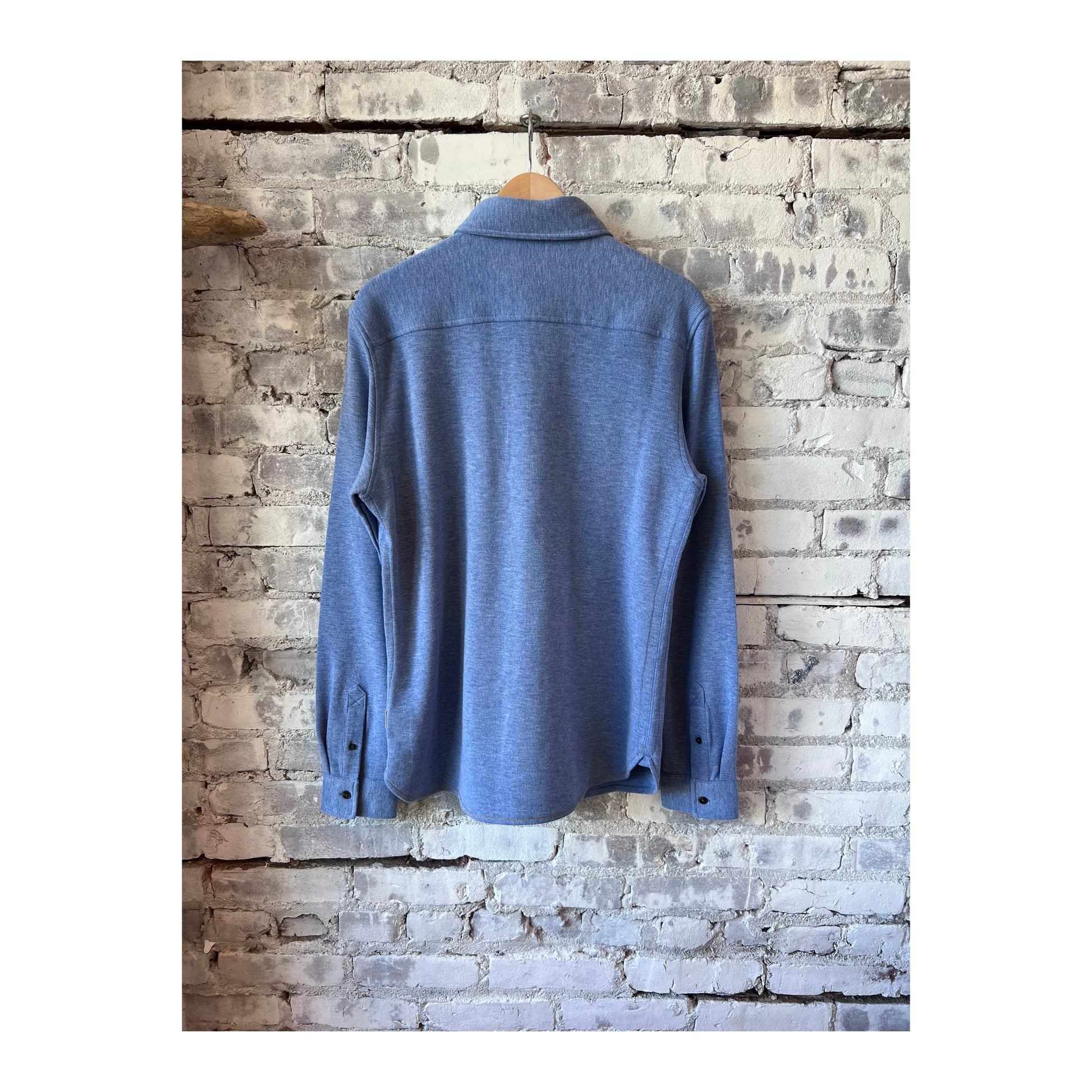 Men's Rex Soft Knit Shirt in Blue Heather by Surfside Supply, featuring a cozy knit texture and casual fit.