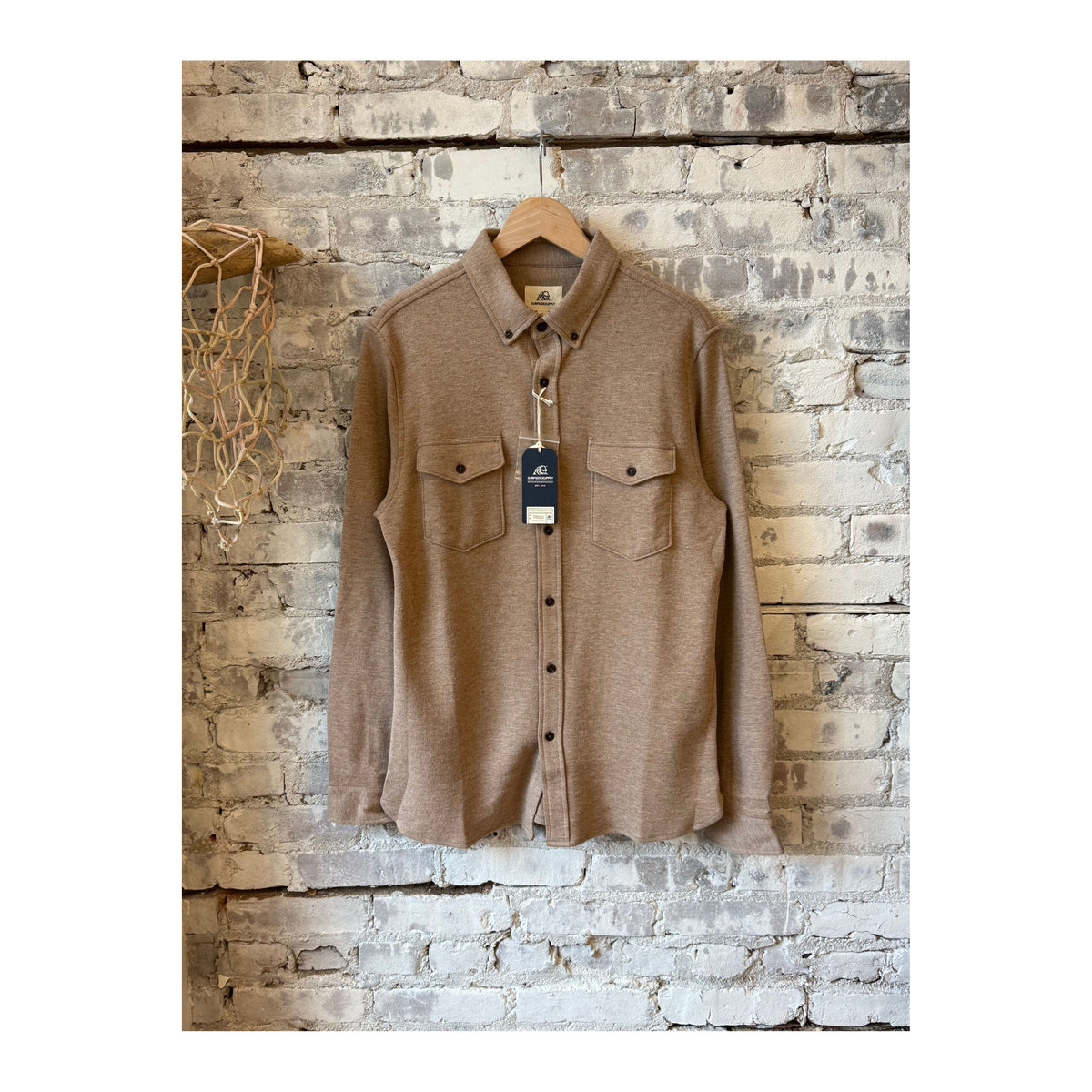 Men's Rex Soft Knit Shirt in camel heather from Surfside Supply, featuring a cozy knit fabric and casual fit.