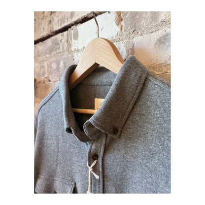 Men's Rex Soft Knit Shirt in Charcoal Heather by Surfside Supply, featuring a close-up of the cozy knit fabric and collar.