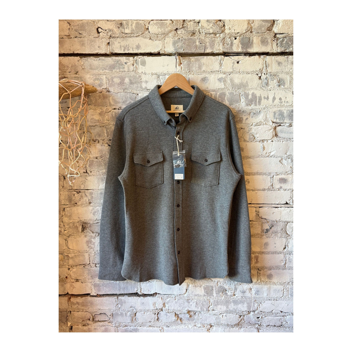 Men's Rex Soft Knit Shirt in Charcoal Heather by Surfside Supply, featuring a comfortable soft knit fabric and casual fit.
