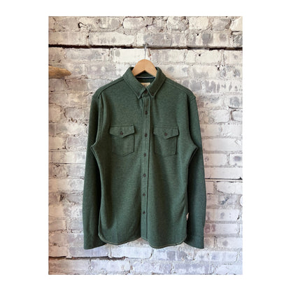 Men's Rex Soft Knit Shirt in Green Heather by Surfside Supply, shown laid flat highlighting its soft knit fabric and casual style.