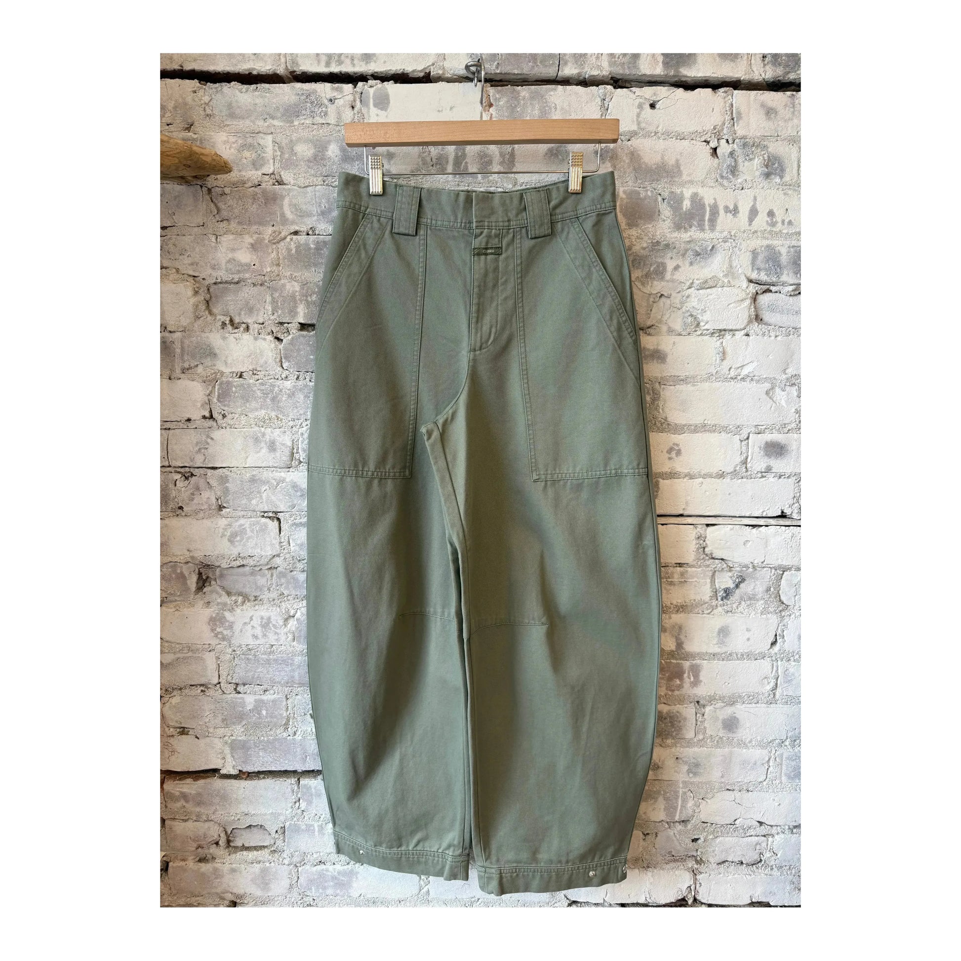 Women's Rhannon Barrel Pants by Closed in faded green denim, with relaxed fit and high waist, shown on a model.