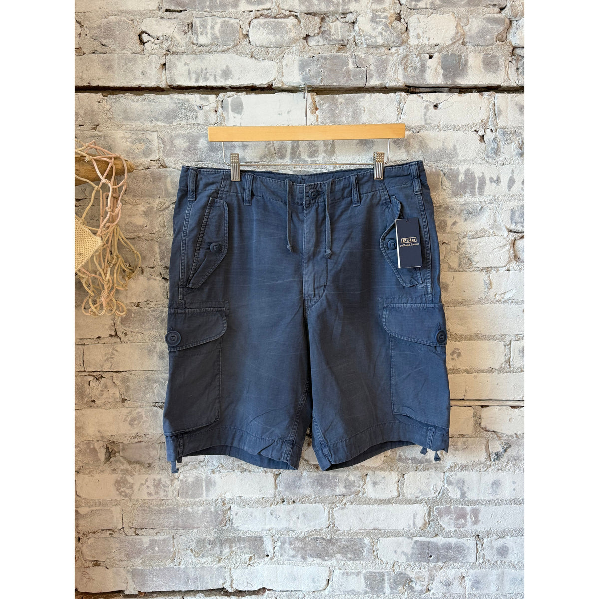 Men's Polo RL ripstop drawstring cargo shorts in old royal color with 8-inch inseam, featuring multiple pockets and sturdy fabric.