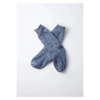 Men's Double-Face Crew Socks by Rototo in Deep Ocean color, featuring a soft, double-layer fabric with a textured pattern.