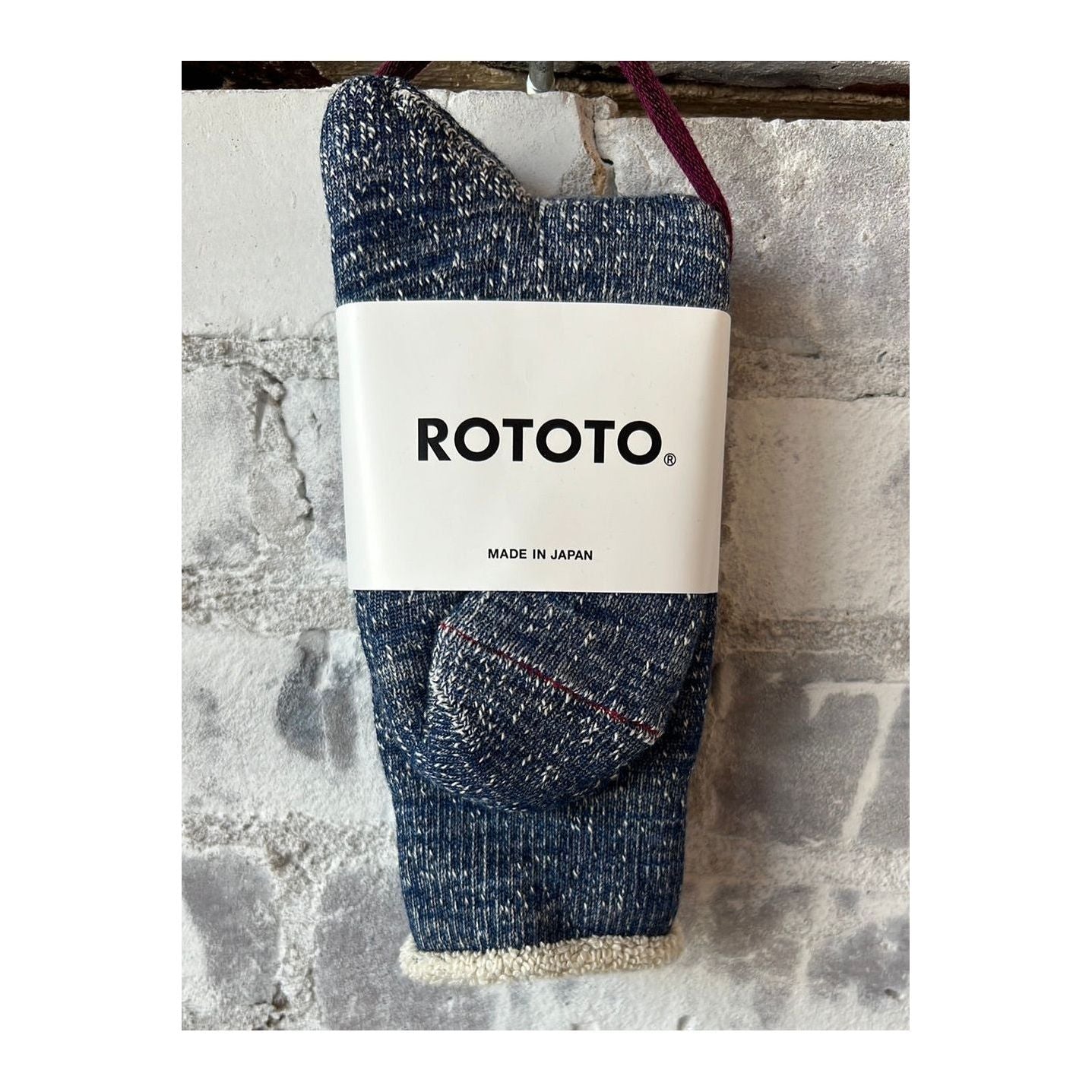 Men's Double-Face Crew Socks by Rototo featuring a deep ocean blue and patterned design, made for comfortable everyday wear.