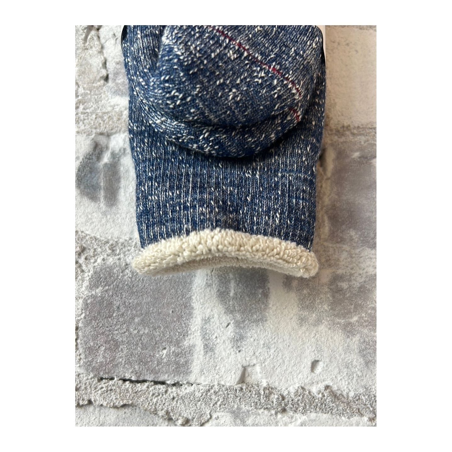 Men's double-face crew socks by Rototo in deep ocean color, featuring a soft knit pattern and comfortable fit.