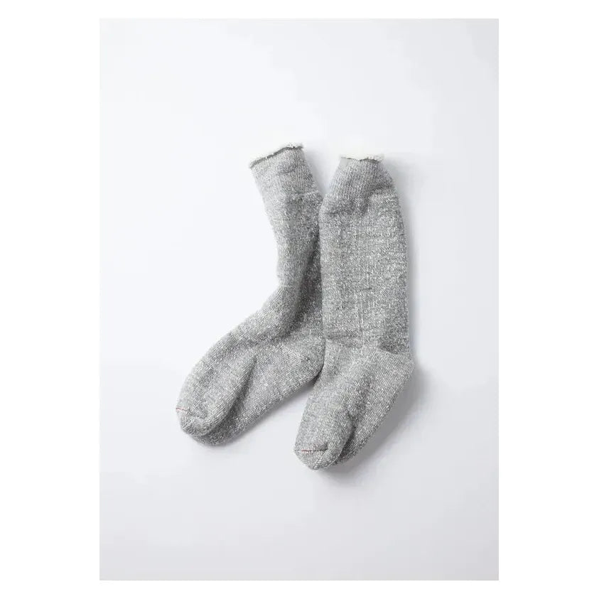 Men's Rototo double-face crew socks in medium gray, soft knit fabric with a comfortable ribbed cuff and subtle brand logo detail