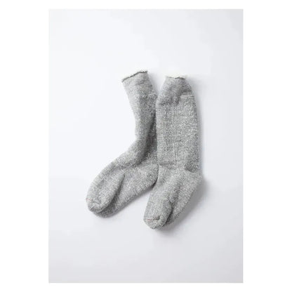 Men's Rototo double-face crew socks in medium gray, soft knit fabric with a comfortable ribbed cuff and subtle brand logo detail