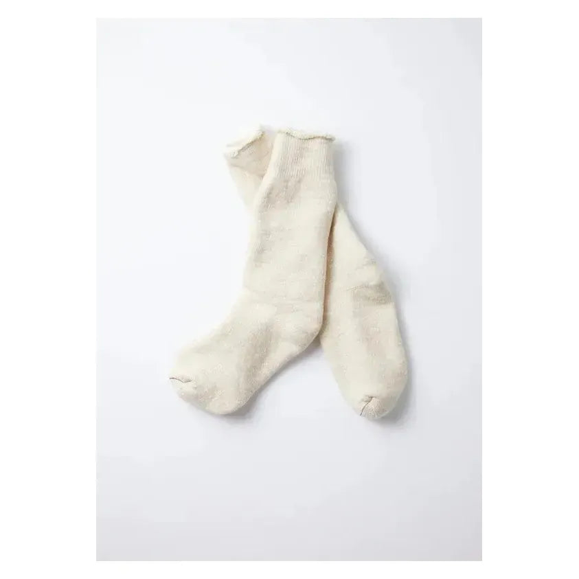 Men's double-face crew socks by Rototo in oatmeal, showing the soft, textured fabric and comfortable fit.
