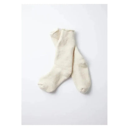 Men's double-face crew socks by Rototo in oatmeal, showing the soft, textured fabric and comfortable fit.