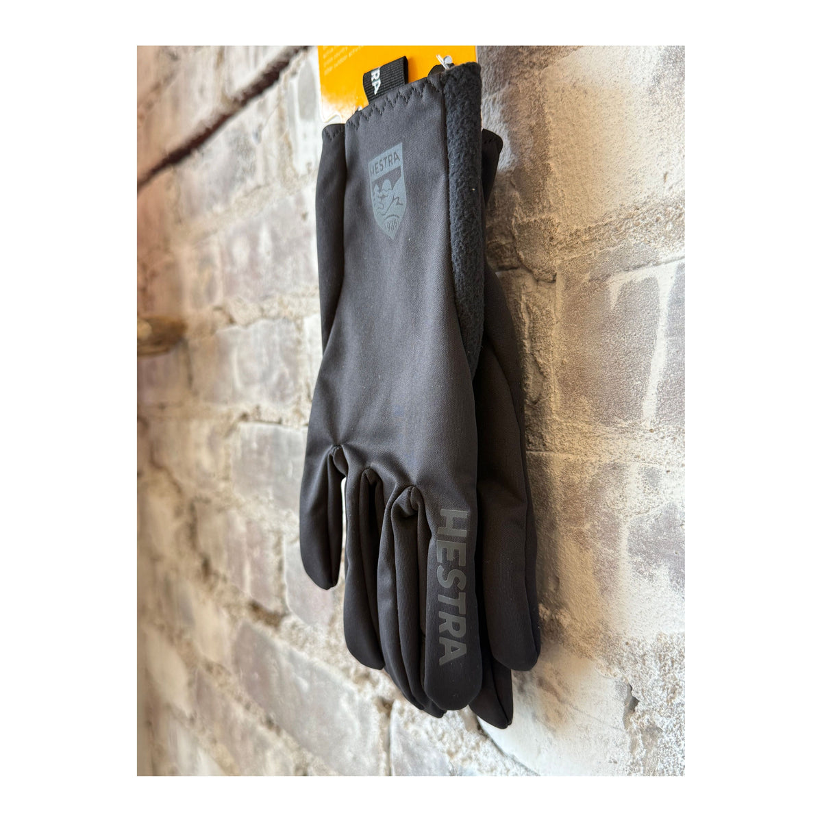 Men's Hestra Runner's All Weather 5 Finger Glove in black, designed for running and outdoor activities in various weather conditions.