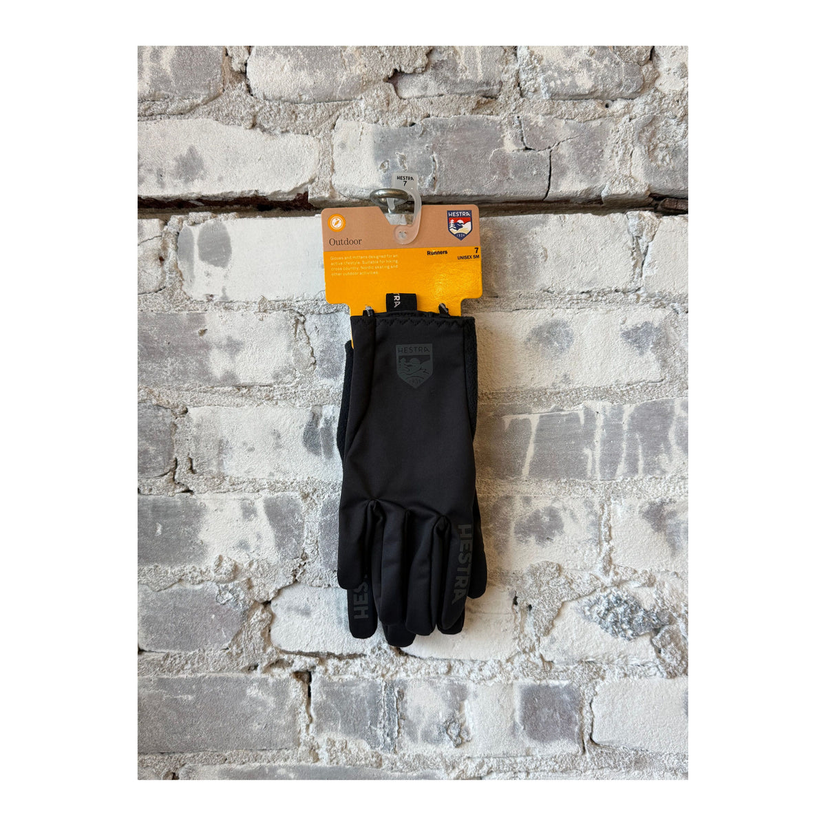 Men's Hestra Runner's All Weather 5 Finger Glove in black showing the glove's textured fabric and five-finger design for outdoor running.