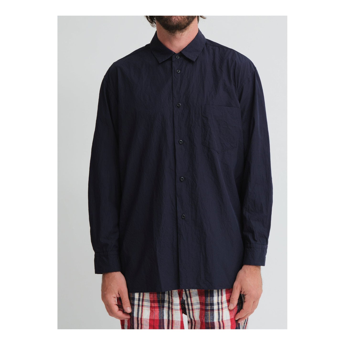 Men's navy crinkle typewriter shirt with regular collar by Sage De Cret, showcasing the textured fabric and classic fit.