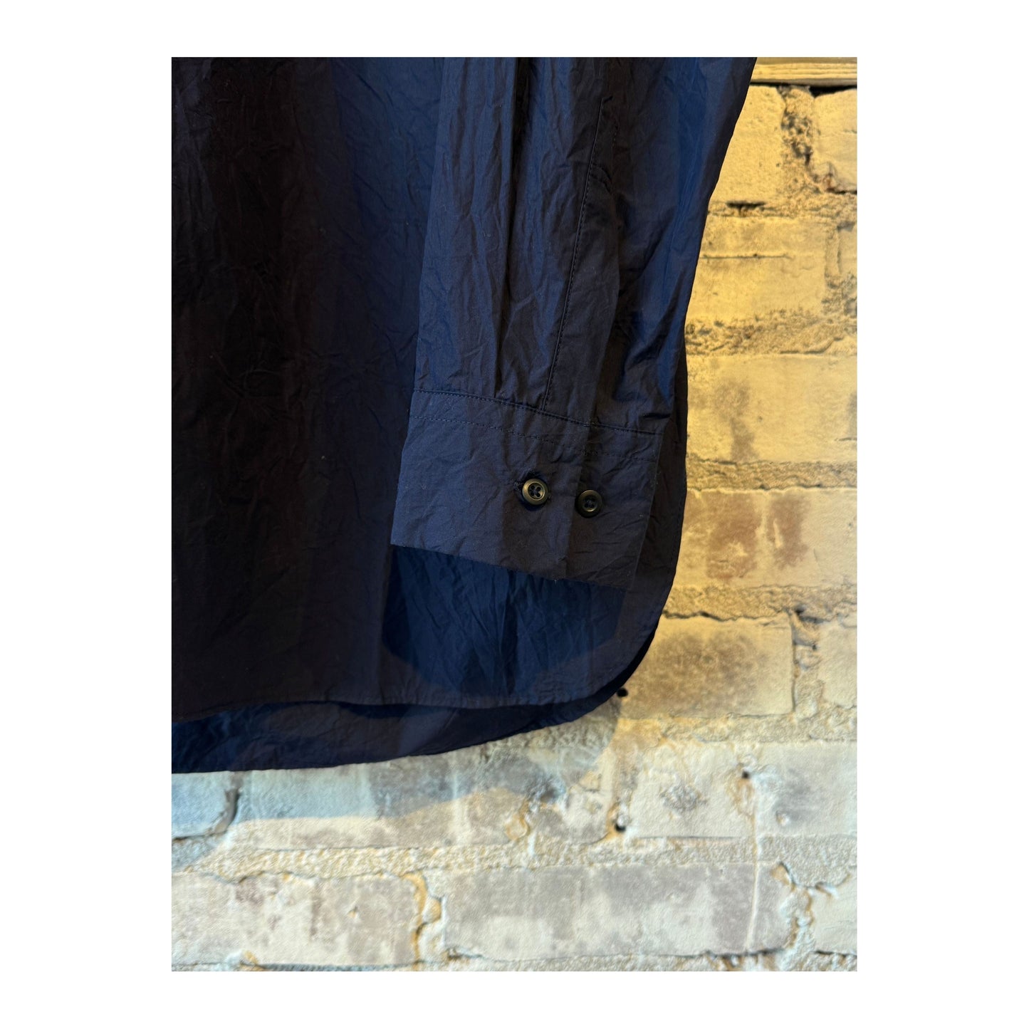 Men's navy Crinkle Typewriter Regular Collar Shirt by Sage De Cret, shown in a close-up of the textured fabric and collar detail.