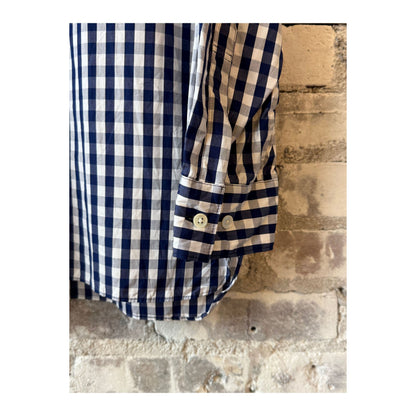 Men's navy gingham check regular collar shirt by Sage De Cret, showing close-up of the classic pattern and collar details.