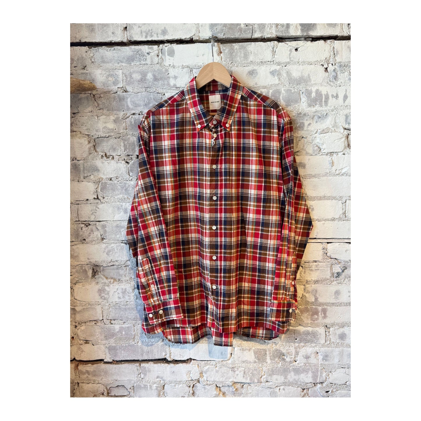Men's Sage De Cret Madras check button-down shirt in red plaid with collar and long sleeves.