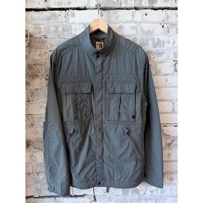 Men's Sailcloth Tanker in Steel Grey by Relwen, showcasing a casual, durable jacket with a high collar and front pockets.