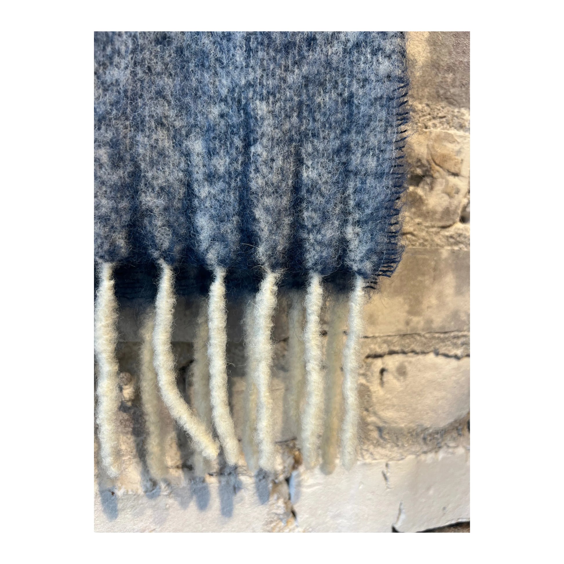 Men's NN07 wool blend scarf in blue multi with a cozy, textured knit pattern, styled for a casual look.
