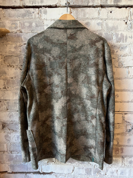 Olive camouflage scuba back jacket by Jerry Kaye, featuring a stylish design and comfortable fit, displayed on a hanger.