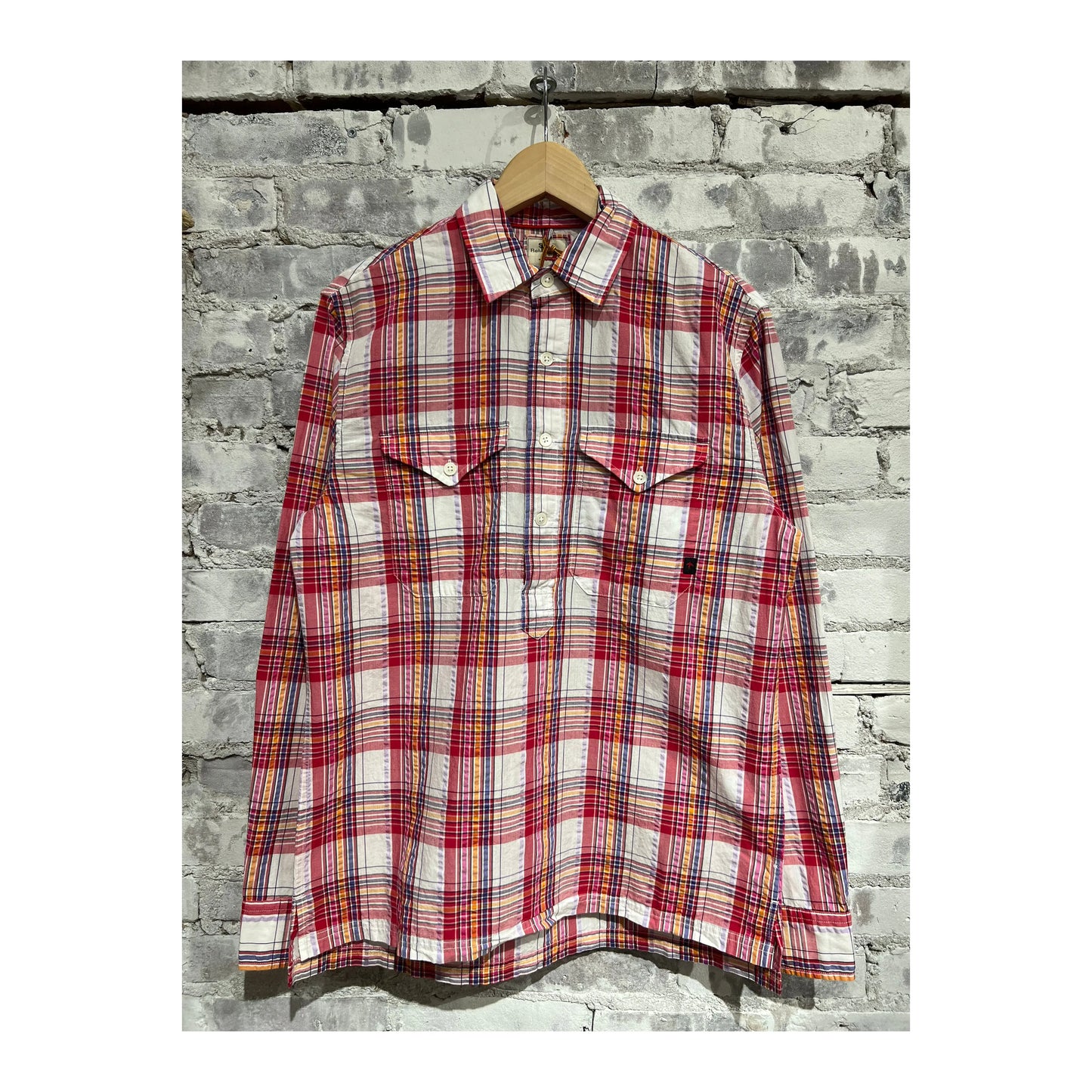 Men's red multi plaid seersucker popover shirt by Relwen, featuring lightweight fabric and classic button-up style.