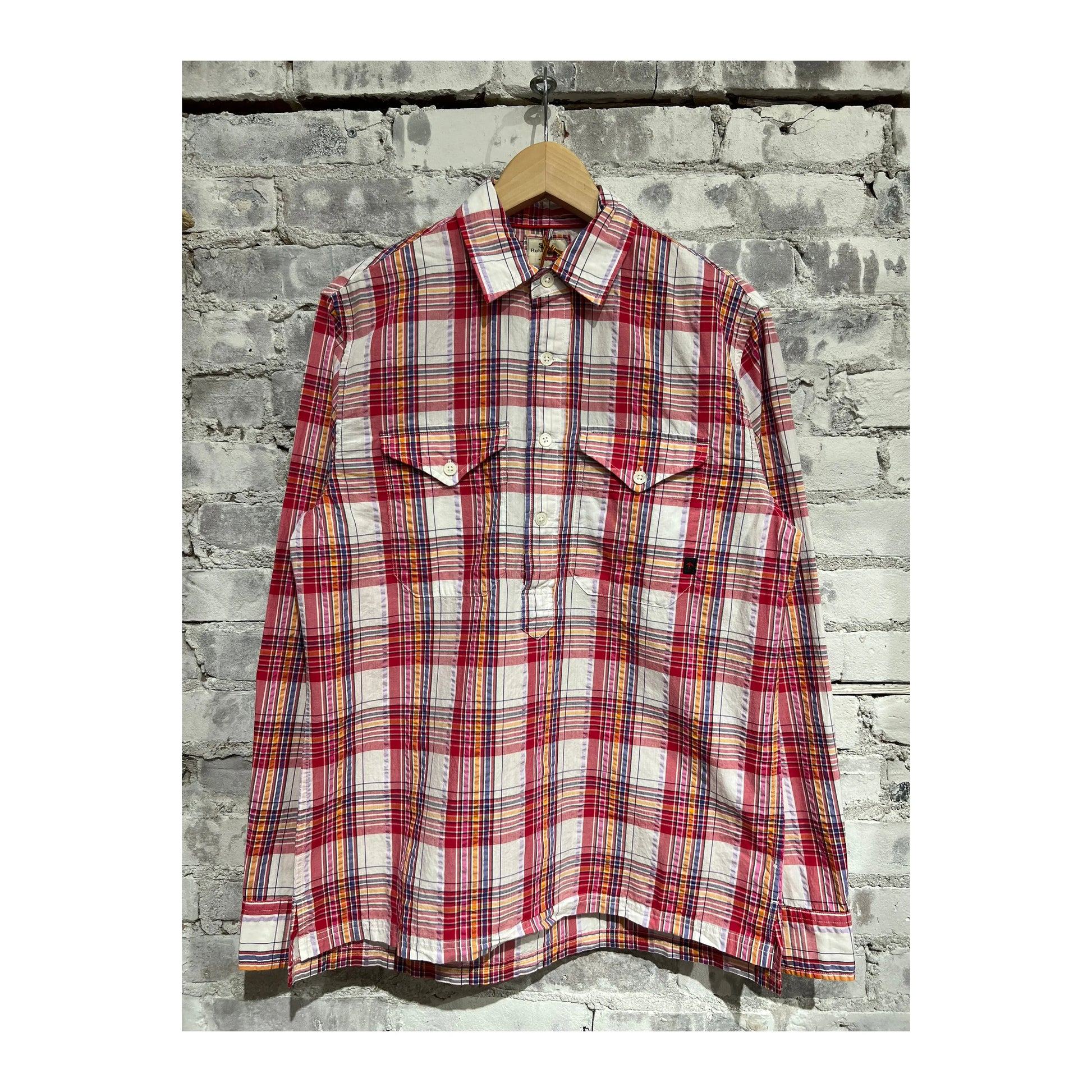 Men's red multi plaid seersucker popover shirt by Relwen, featuring lightweight fabric and classic button-up style.
