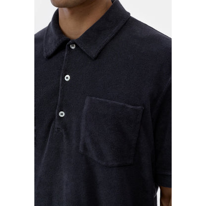 Men's short sleeve polo shirt in Magma Black by Closed Men's, featuring a classic collar and comfortable fit.