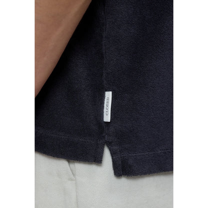 Men's short sleeve polo shirt in Magma Black by Closed Men's, featuring a classic collar and comfortable fit.