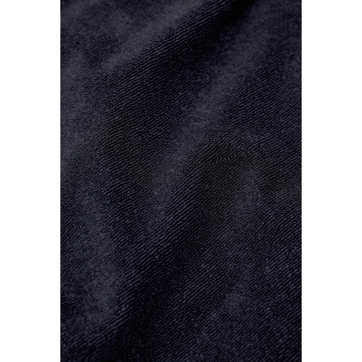 Men's short sleeve polo shirt in Magma Black by Closed Men's, featuring a classic collar and casual fit.