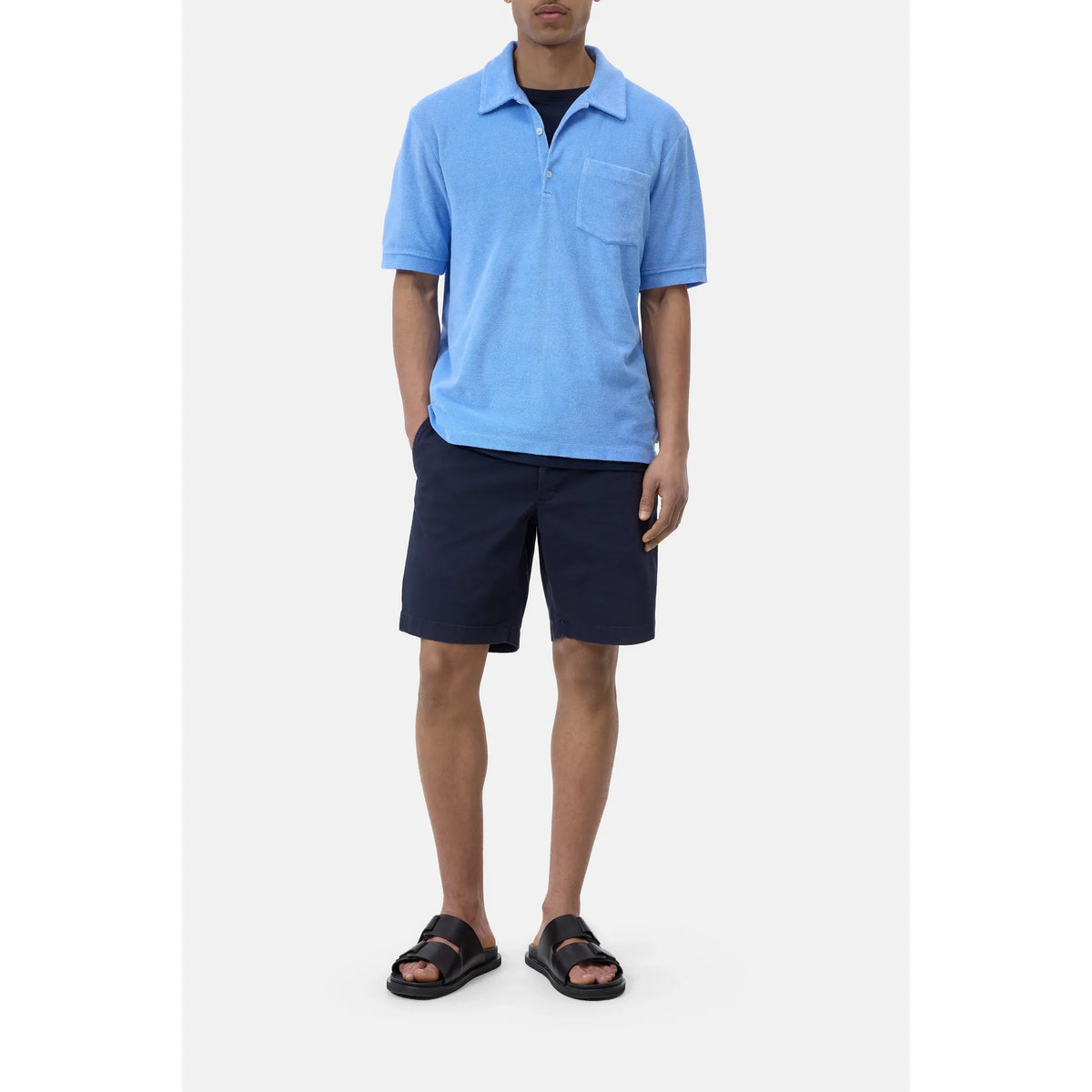 Men's sky blue short sleeve polo shirt by Closed Men's, featuring a classic collar and comfortable fit.