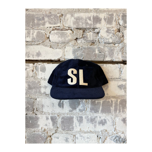 Colorful "SL" Patch Letterman Floppy Cord Hat by Local Supply Club, casual accessories with a relaxed, floppy style in assorted colors.