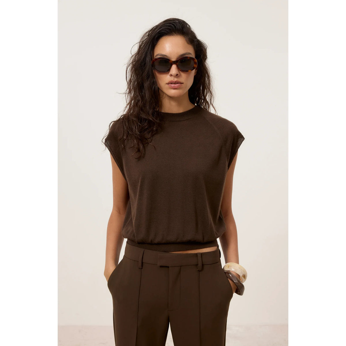 Women's sleeveless cashmere and silk crewneck jumper in maple brown by Closed, featuring a soft, luxurious fabric and stylish sleeveless design.