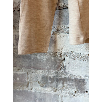 Women's soft-touch Merrow edge boatneck long-sleeve top by Majestic Filatures in ecru fabric, close-up of neckline and sleeve detail.