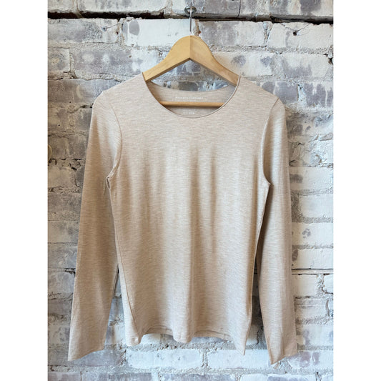 Women’s soft-touch Merrow edge boatneck long sleeve top by Majestic Filatures in ecru fabric.