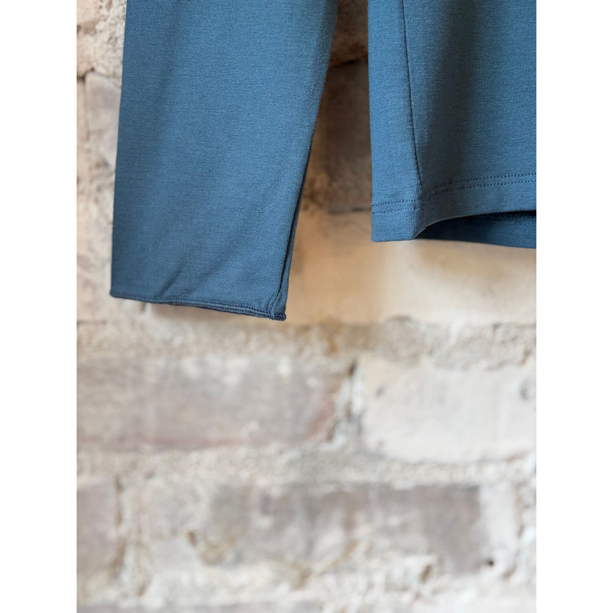 Women's Soft-Touch Merrow Edge Boatneck Long Sleeve top by Majestic Filatures in marine color, featuring a boatneck collar and smooth fabric.