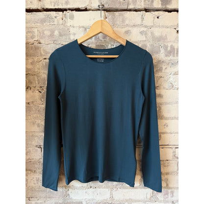 Women's soft-touch Merrow edge boatneck long-sleeve top by Majestic Filatures in marine color, featuring a boatneck neckline and smooth fabric.