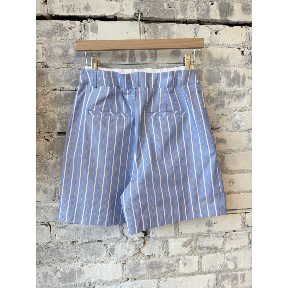 Women's ACARIA STUDIO Soulmate Twill Shorts in blue and white stripe, showing the lightweight fabric and stylish striped design.