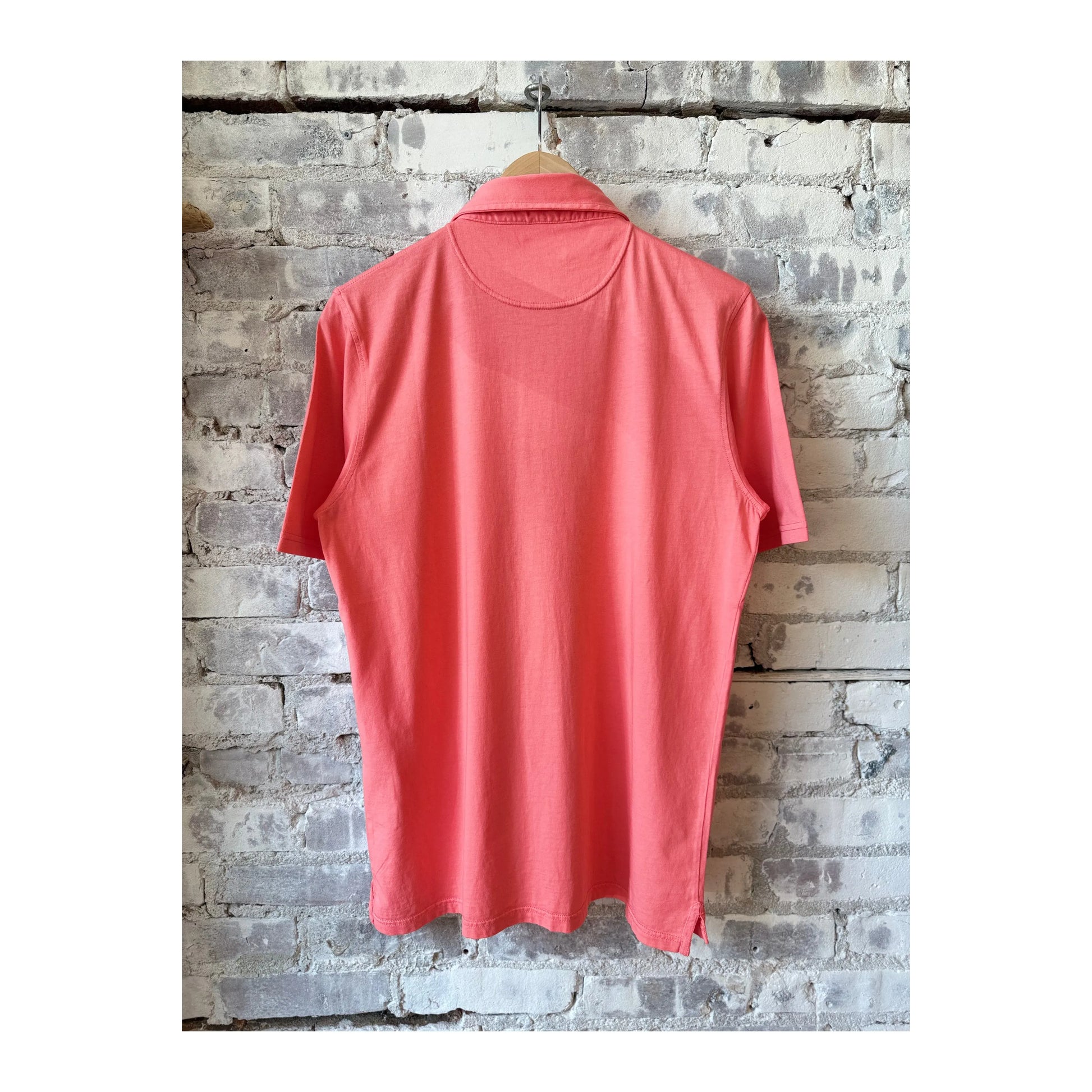 Men's Hartford SS Cotton Jersey Polo in Faded Coral, showcasing a casual fit with short sleeves and a classic collar.