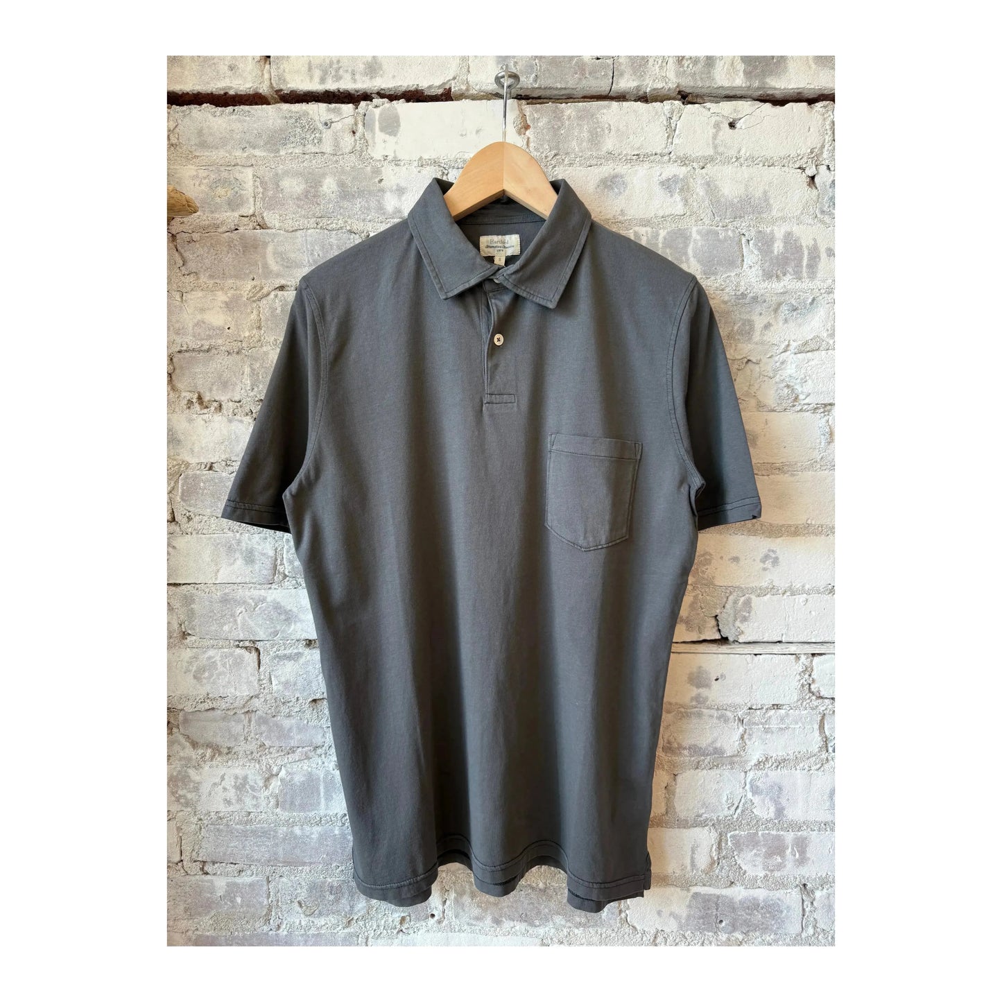 Men's Hartford Thunder SS Cotton Jersey Polo shirt, white with navy collar, showcasing a classic men's polo with short sleeves.