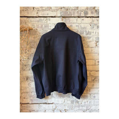 Men's navy Stanton Wool Twill Jacket by Aspesi, showing close-up of tailored wool twill fabric and classic fit design.