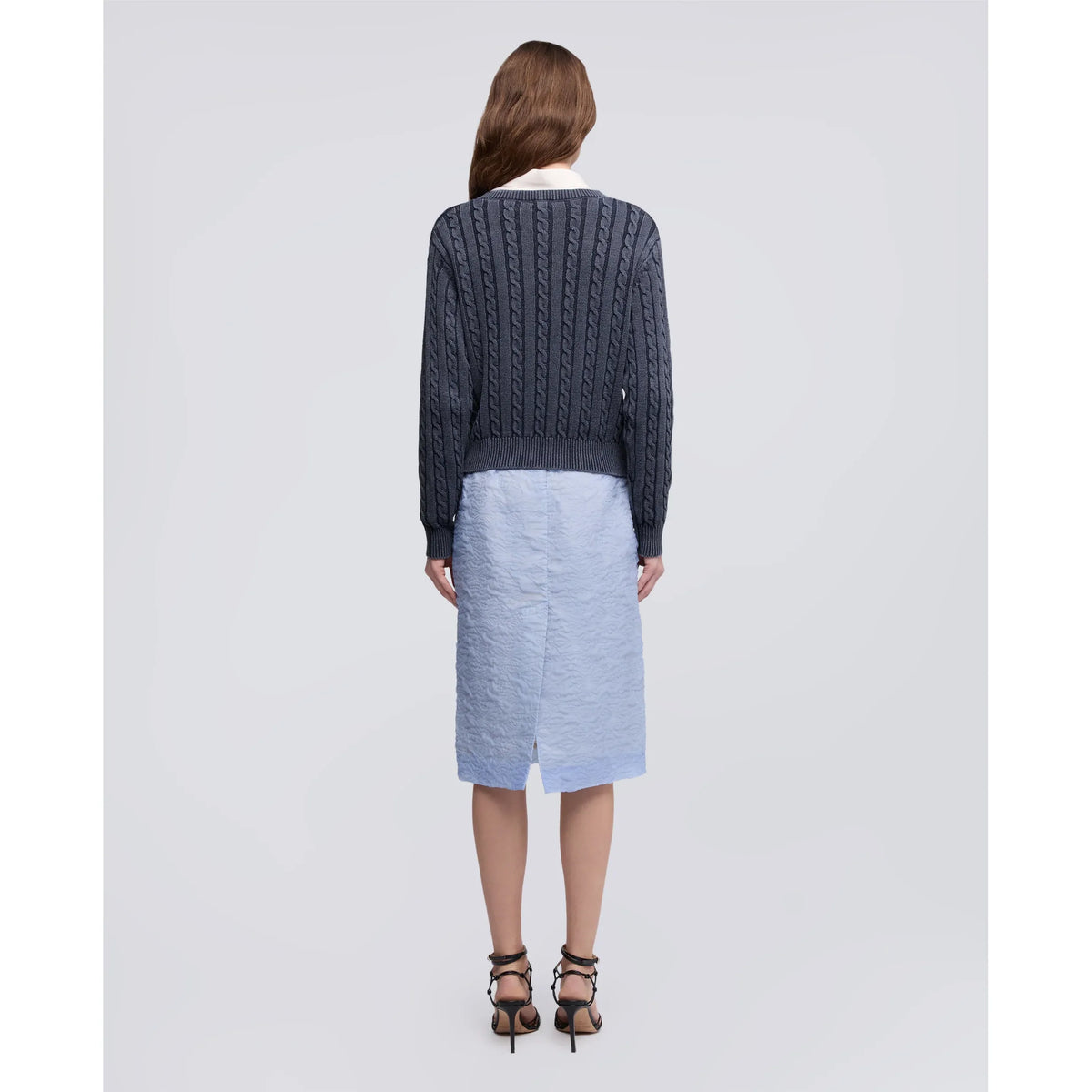 Women's blue stone-washed cotton cable-knit sweater by Aspesi, showcasing a cozy, textured knit design.