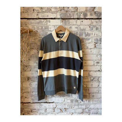 Men's sueded rugby polo in stormy weather colorblock by Marine Layer, showing the shirt's textured fabric and colorblock design.