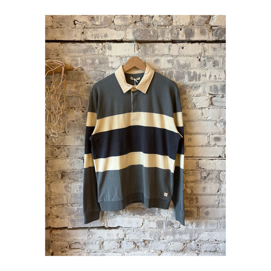 Men's sueded rugby polo in stormy weather colorblock by Marine Layer, showing the shirt's textured fabric and colorblock design.