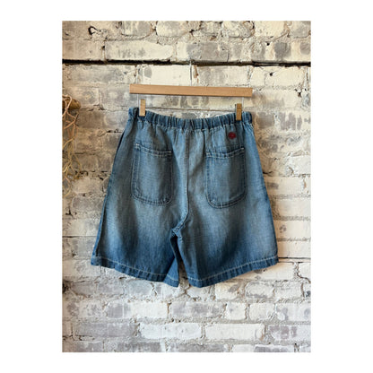 Men's Sunny Afternoon Shorts in light wash chambray by MONOSTERO, featuring a relaxed fit and casual style.