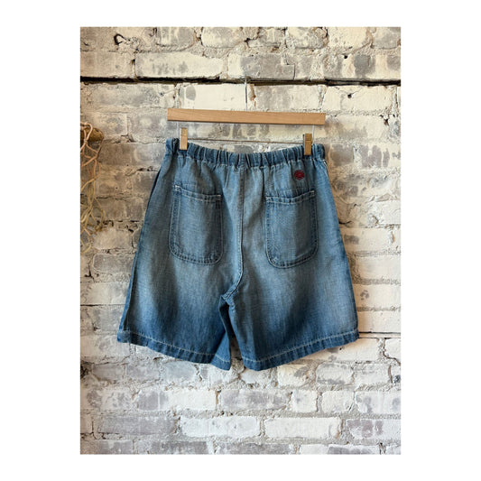 Men's Sunny Afternoon Shorts in light wash chambray by MONOSTERO, featuring a relaxed fit and casual style.
