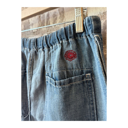 Men's Sunny Afternoon Short in light wash chambray by MONOSTERO, featuring a casual fit with a relaxed, stylish look.