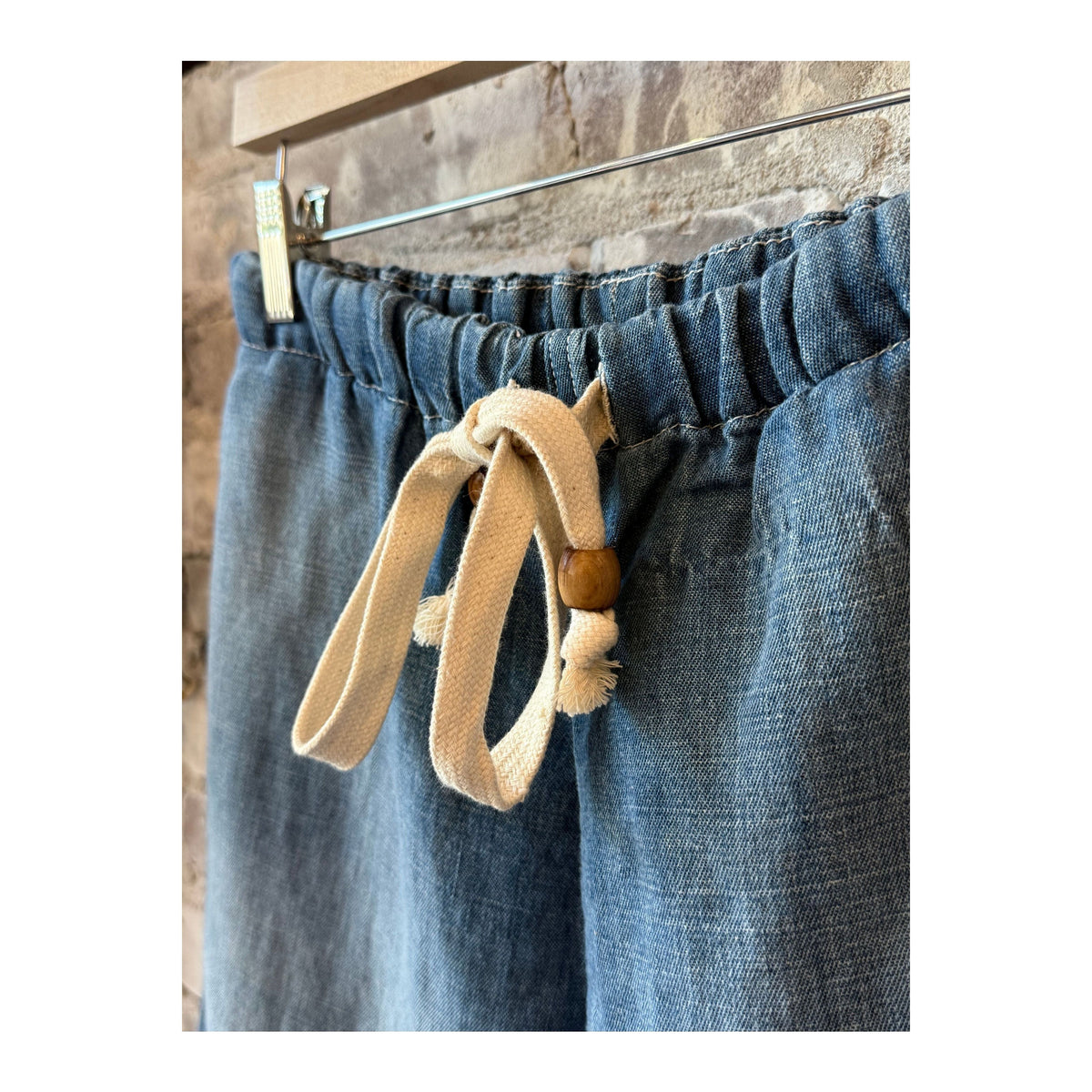 Men's Sunny Afternoon Shorts in light wash chambray by MONOSTERO, featuring a relaxed fit and casual style.