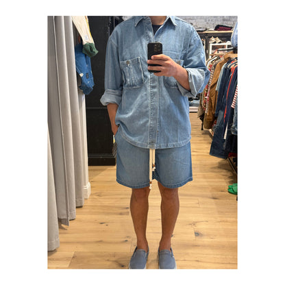 Men's light wash chambray Sunny Afternoon shorts by MONOSTERO, featuring a relaxed fit and casual style.
