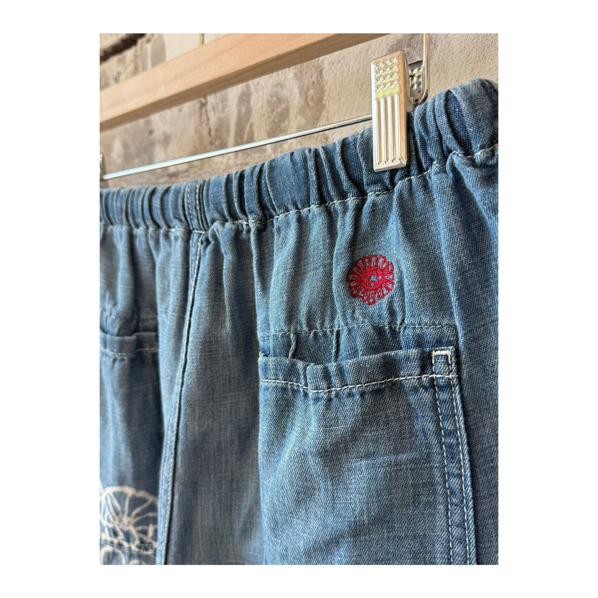 Women's Sunny Afternoon Short in medallion print chambray by MONOSTERO, featuring a relaxed fit and vibrant pattern.
